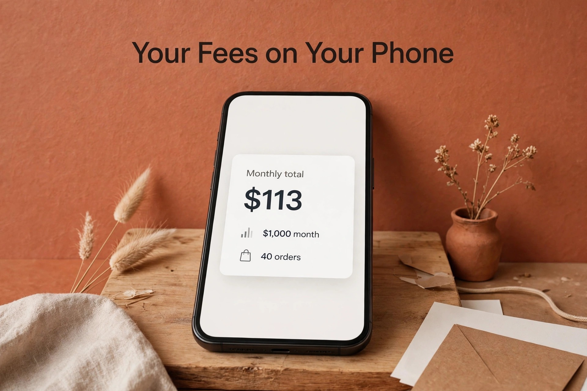 Phone mockup showing a monthly total